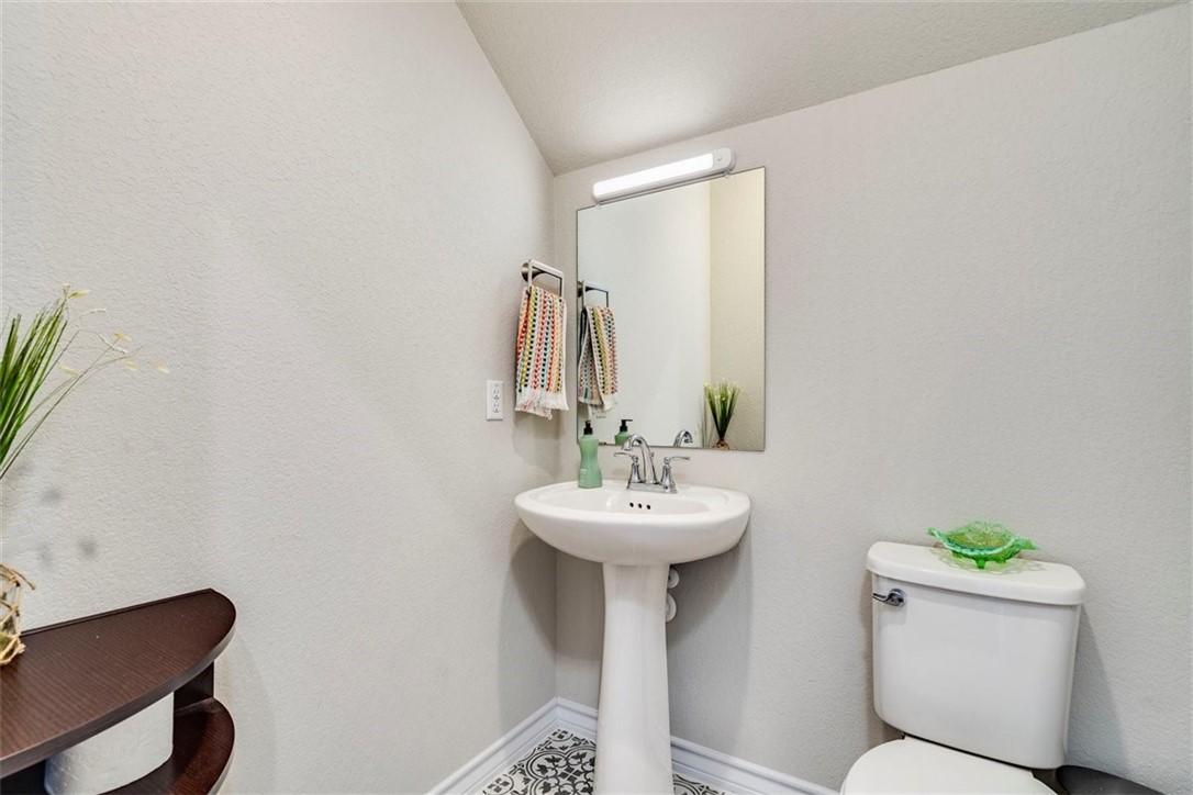 Downstairs powder bath. - If you have additional questions regarding 3208 Bratton Crest Lane  in Austin or would like to tour the property with us call 800-660-1022 and reference MLS# 5470643.